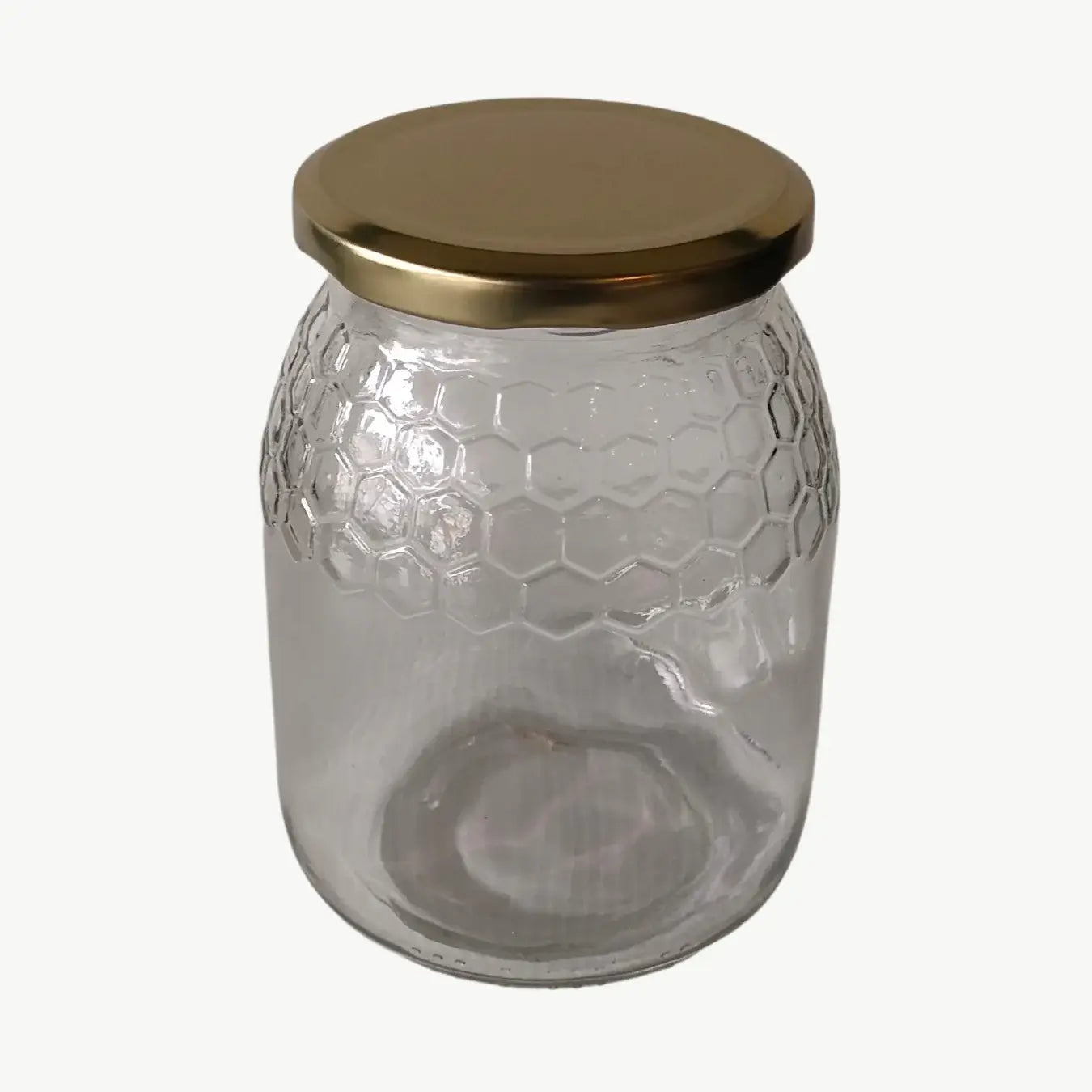 Frasco de vidro em favos, 1kg, com tampa TO77 dourada incluída